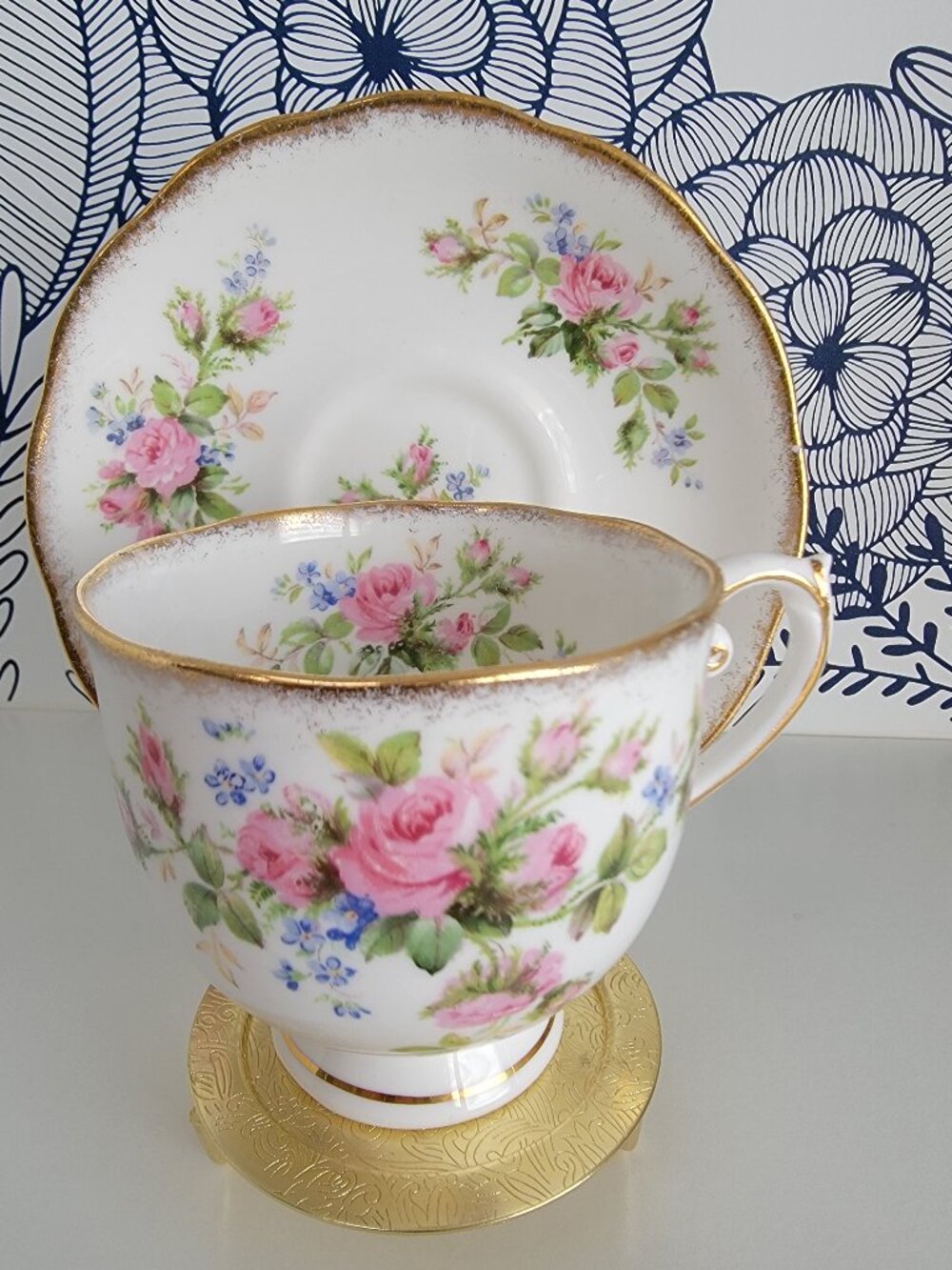 Vintage Roslyn teacup and saucer with pink spray of roses and gold trim